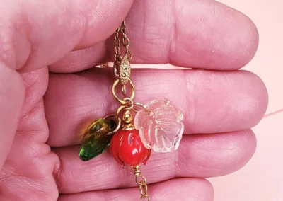 sweet strawberry keychain charm with glass beads, acrylic accents & gold clasp